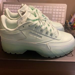 Cardi B Club C Reeboks in Aqua Dusk color.